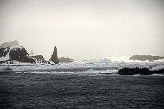 19C Passing By Jagged Aitcho Islands Part Of South Shetland Islands With Drift Ice From Quark Expeditions Cruise Ship In Antarctica.jpg